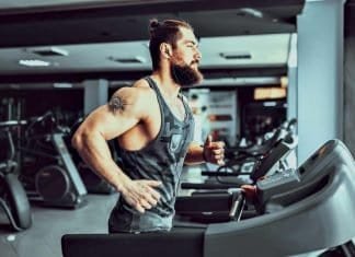 bearded man running on a treadmill