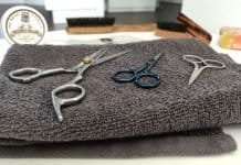 beard and mustache scissors on a piece of towel
