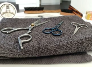 beard and mustache scissors on a piece of towel