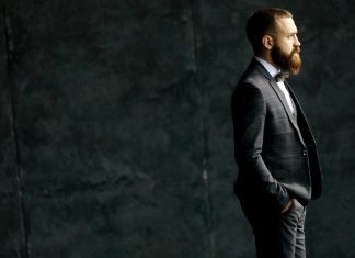 bearded man with a suit
